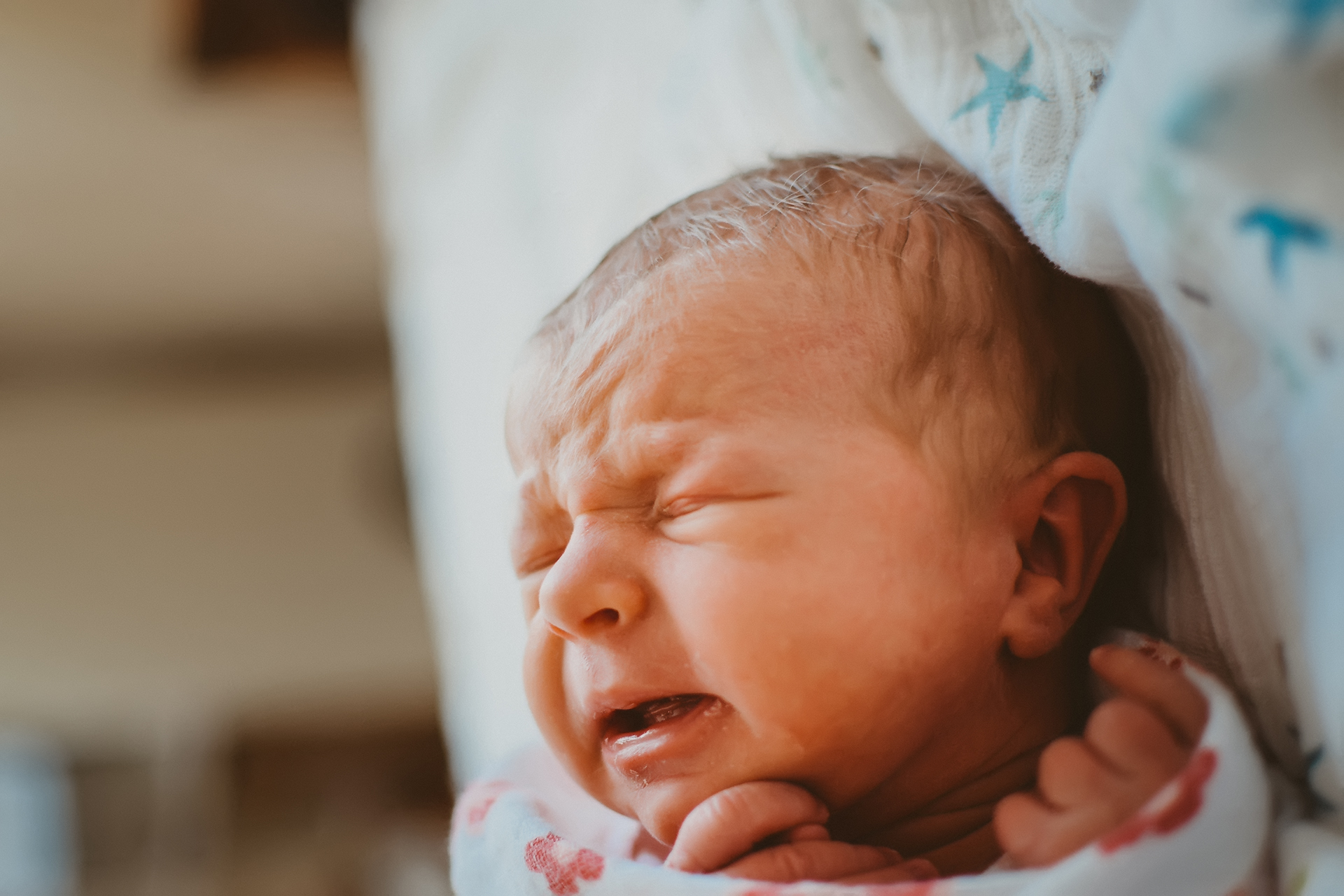 Newborn baby sleeping in swaddle blanket Newborn baby sleeping in swaddle blanket