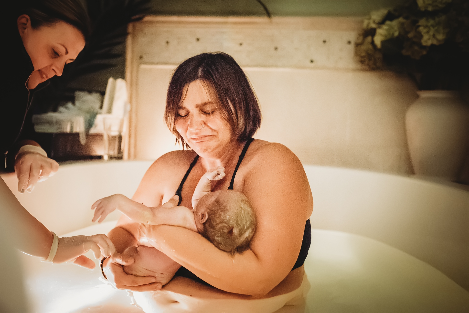 Mother overcome by emotion when she sees her baby for the first time Mother overcome by emotion when she sees her baby for the first time