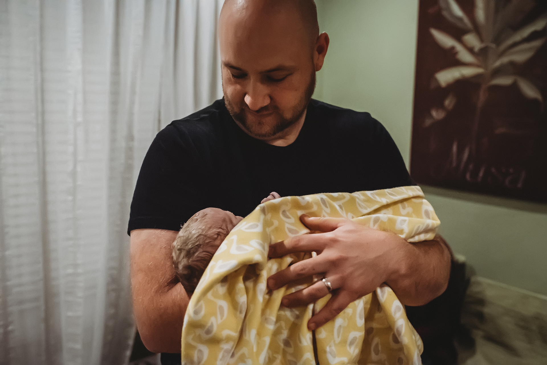 Dad holds his baby girl for the first time Dad holds his baby girl for the first time