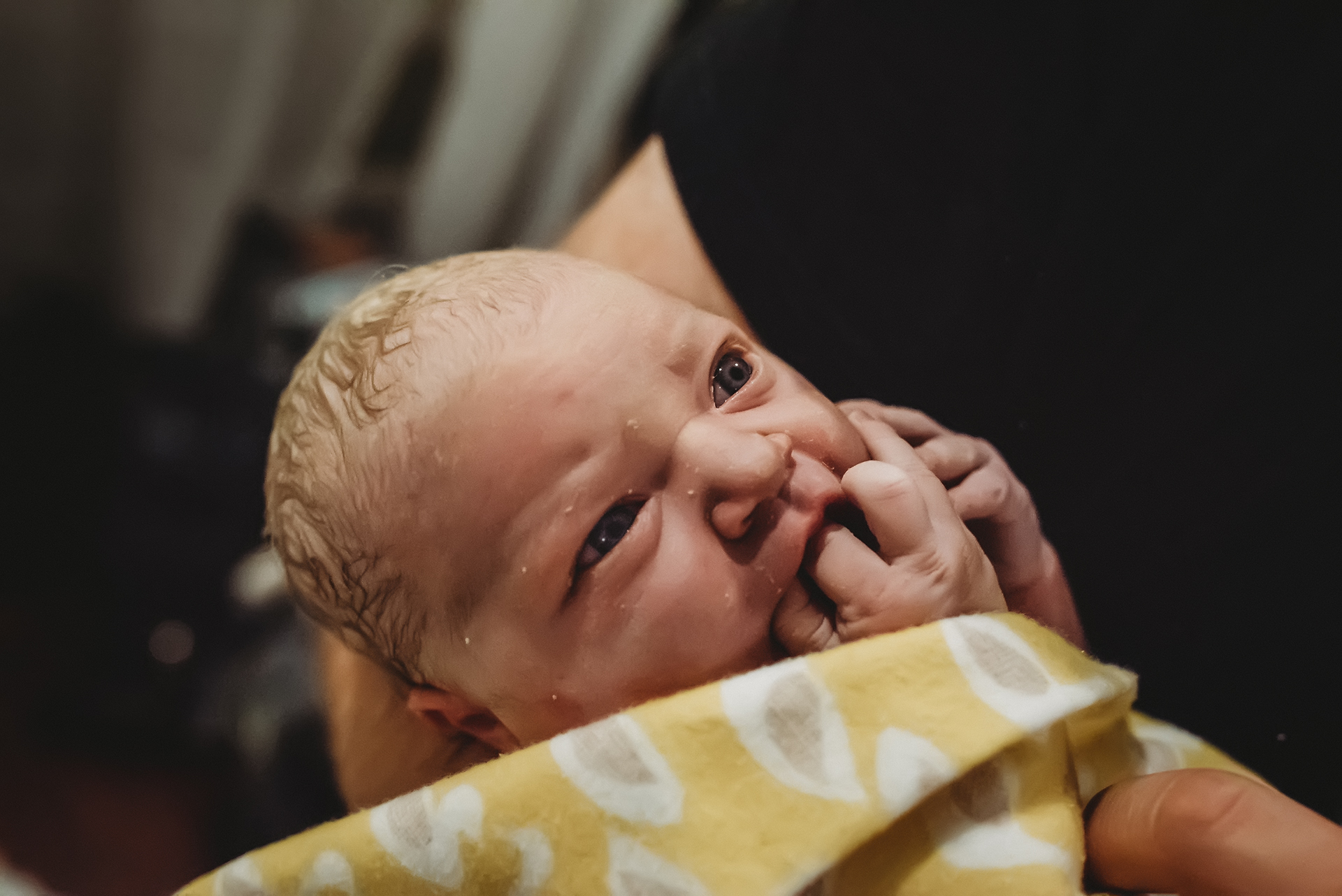Healthy baby girl with vernix on her face Healthy baby girl with vernix on her face